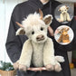 Posable Highland Cow Plush with Alpaca Fur and Flower Crown