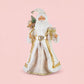 Standing Santa Figurine with Wrapped Presents and Gold Accents, 18 Inch Ivory