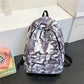 Spacious Backpack with Padded Straps and Graffiti Print, Tear Resistant
