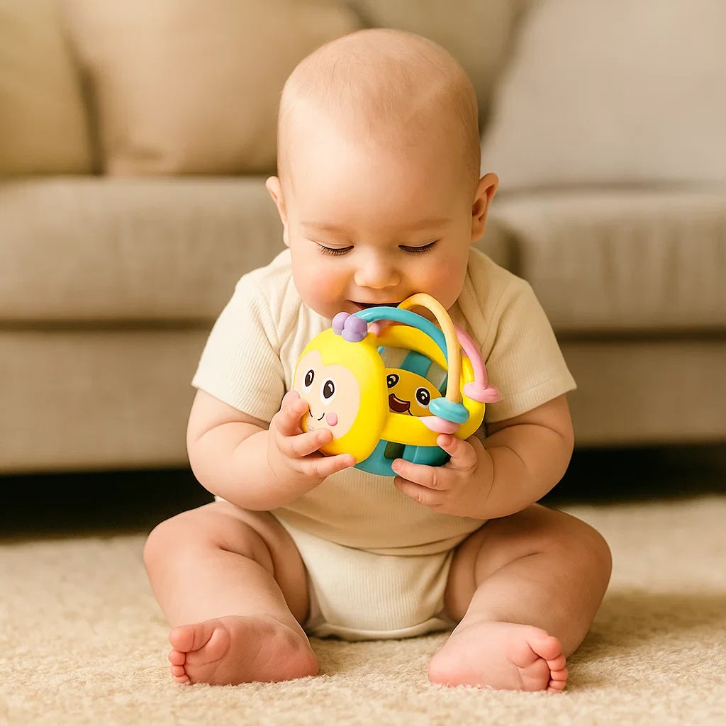 Teething Play Ball with Movable Rings and Textured Surfaces