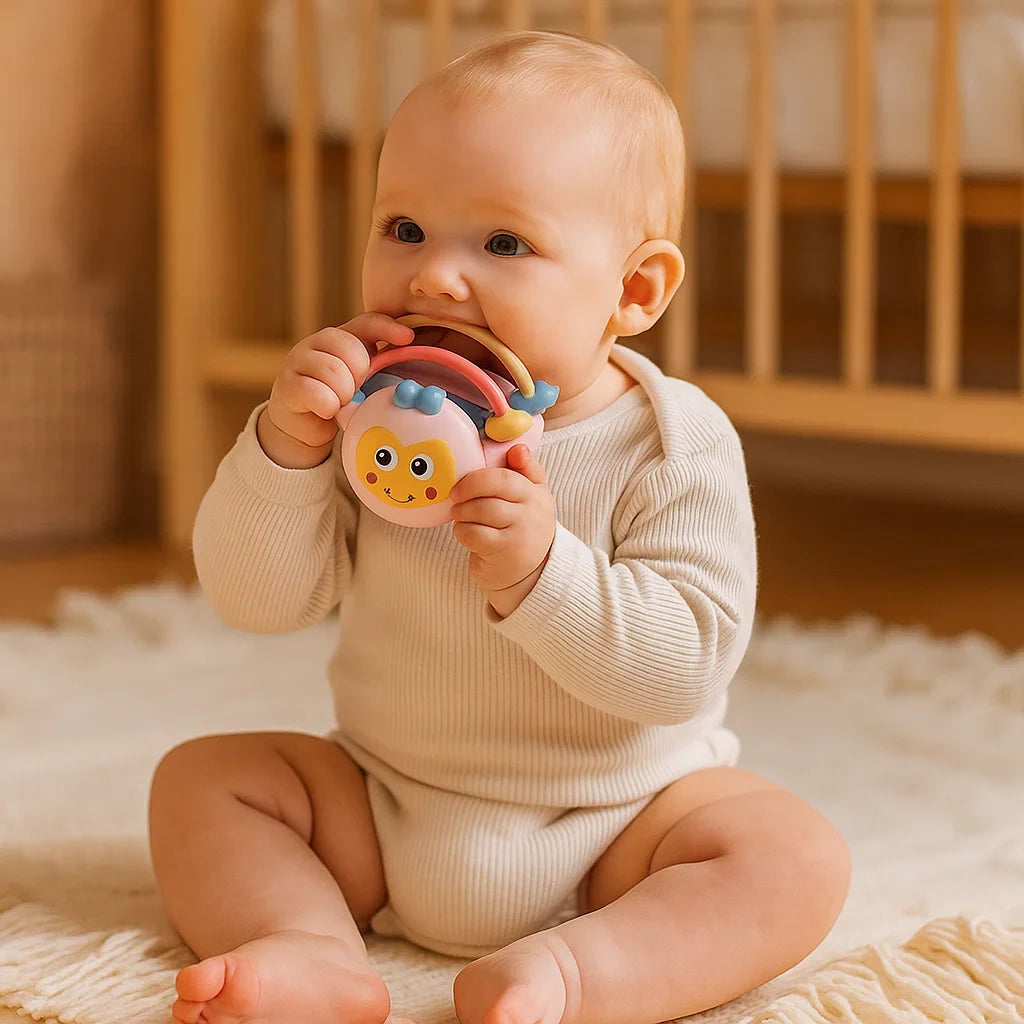 Teething Play Ball with Movable Rings and Textured Surfaces