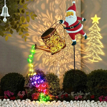 Decorative garden light with Santa Claus figure and colorful lights, casting shadows on a wall.