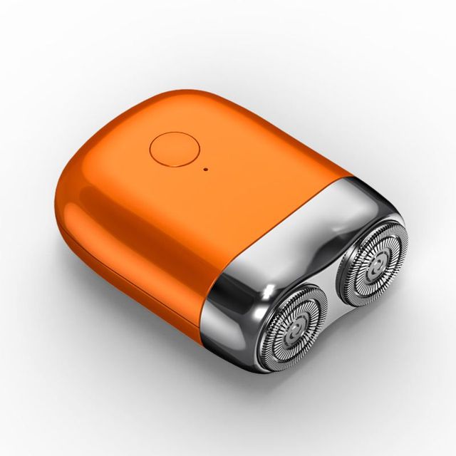 Compact Electric Shaver with Magnetic Charging Base and IPX7 Water Resistance