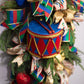 6" Glittered Harlequin Drum Ornament: Red & Blue Lifestyle Photo