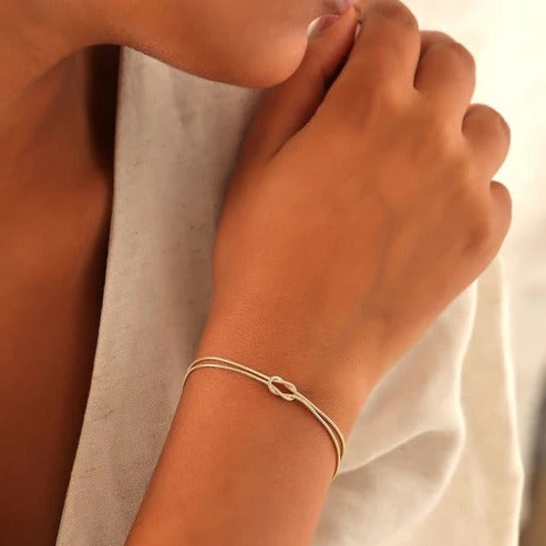 Love Knot Bracelet with Adjustable Closure and Metal Finish Options