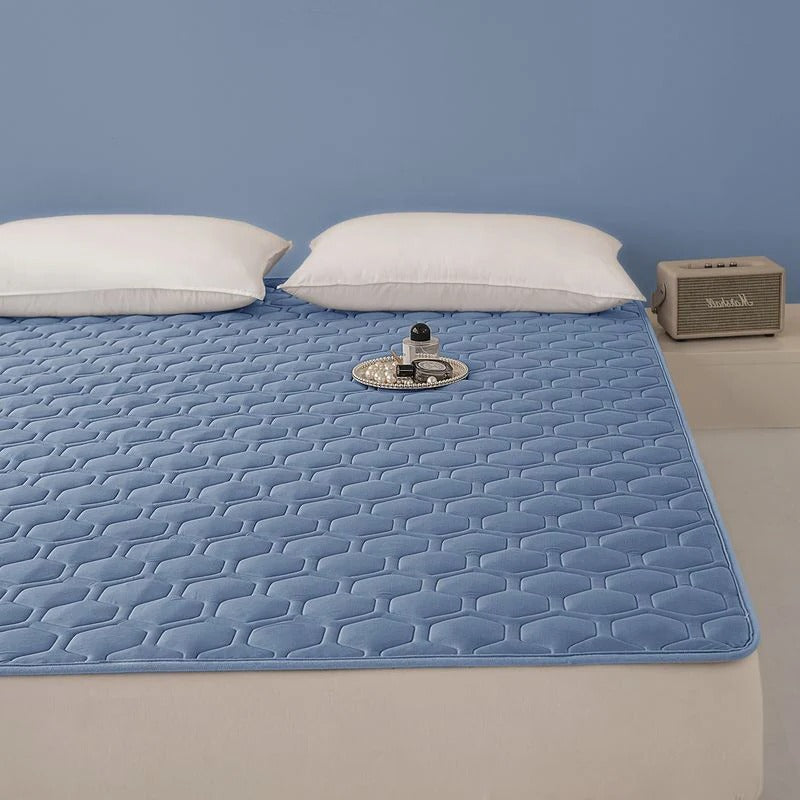 Temperature Regulating Mattress Pad with Quilted Air Channels and Grip Backing