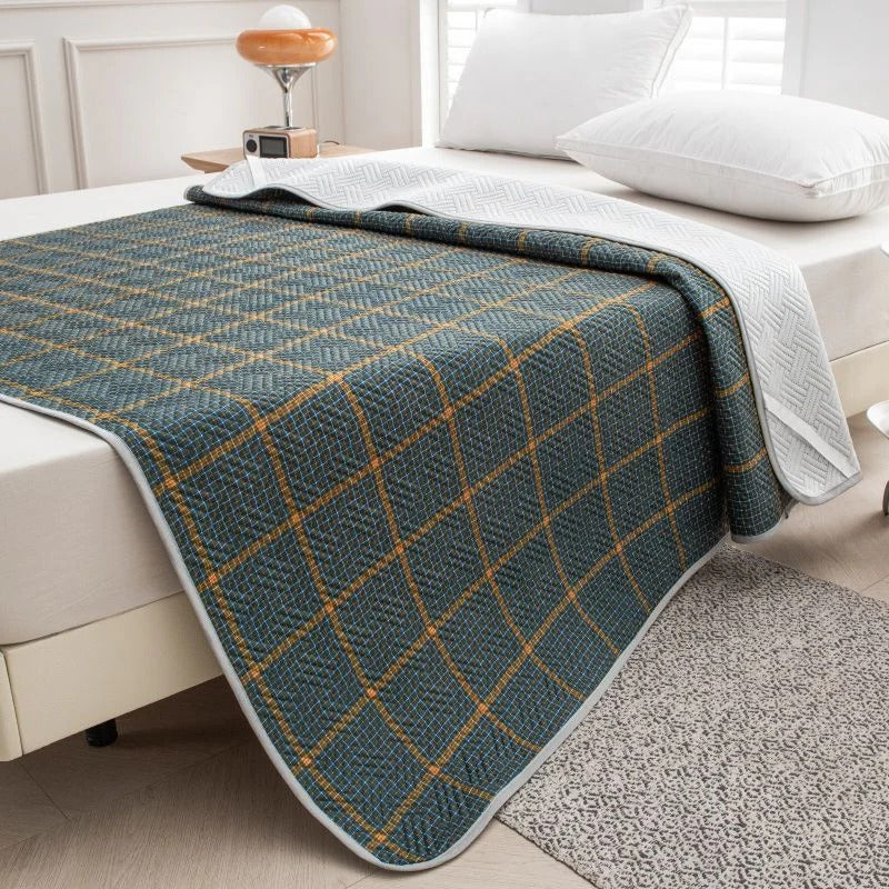 Temperature Regulating Mattress Pad with Quilted Air Channels and Grip Backing