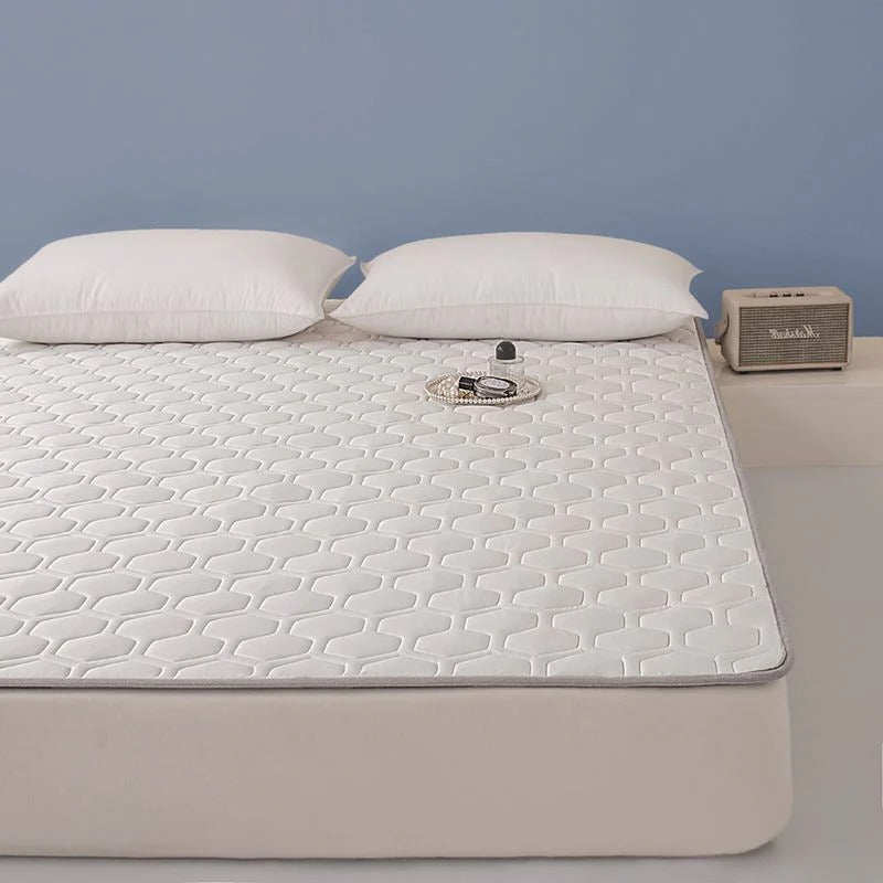 Temperature Regulating Mattress Pad with Quilted Air Channels and Grip Backing