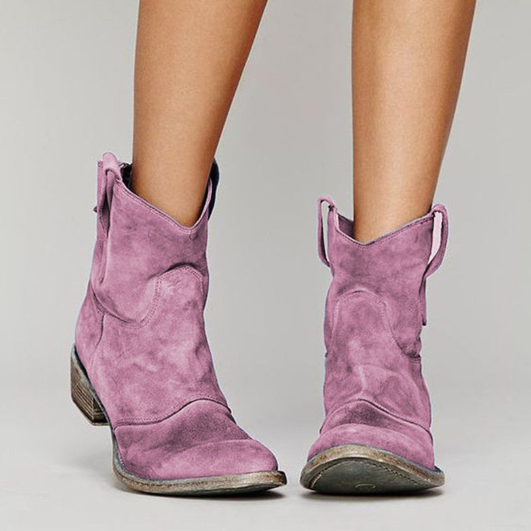 Women's Western ankle boots with a comfortable low heel, rounded toe, and stylish pull tabs.